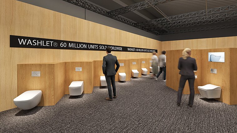 Das Bild zeigt eine Reihe von TOTO-Toiletten, die an einer holzverkleideten Wand mit eingelassenen Nischen ausgestellt sind, wobei jede Nische eine Toilette und eine Informationsgrafik enthält. Über den Ausstellungsstücken prangt der Schriftzug "WASHLET® 60 MILLION UNITS SOLD WORLDWIDE", was auf den globalen Verkaufserfolg der Marke hinweist, während Besucher den Stand betrachten.
